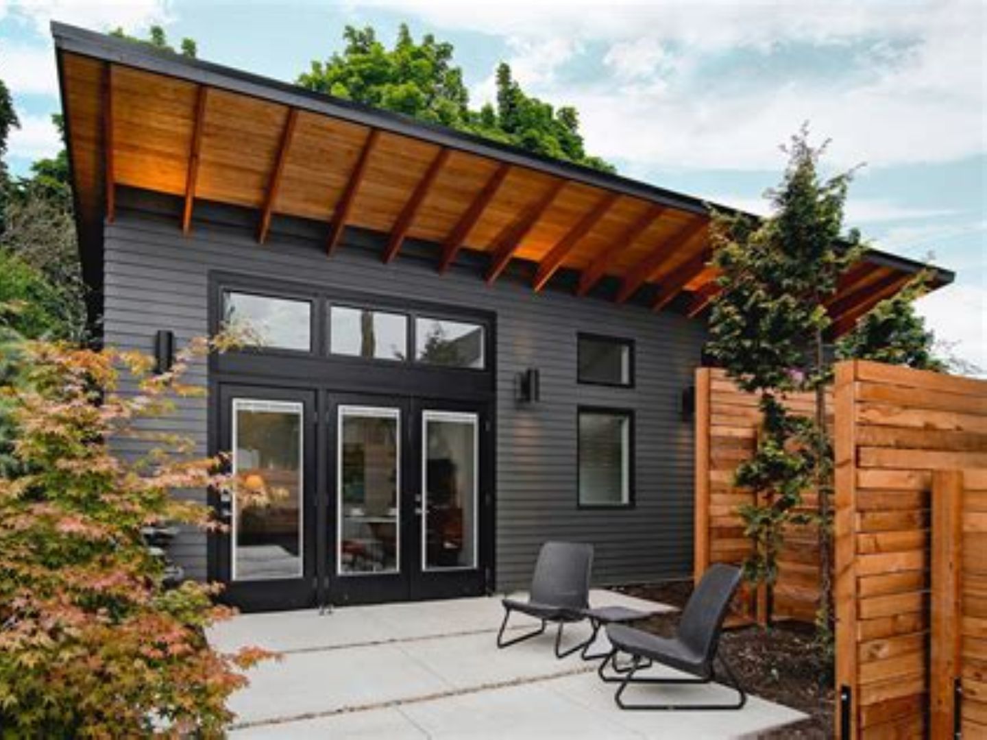 Modern detached ADU with shed roof and patio