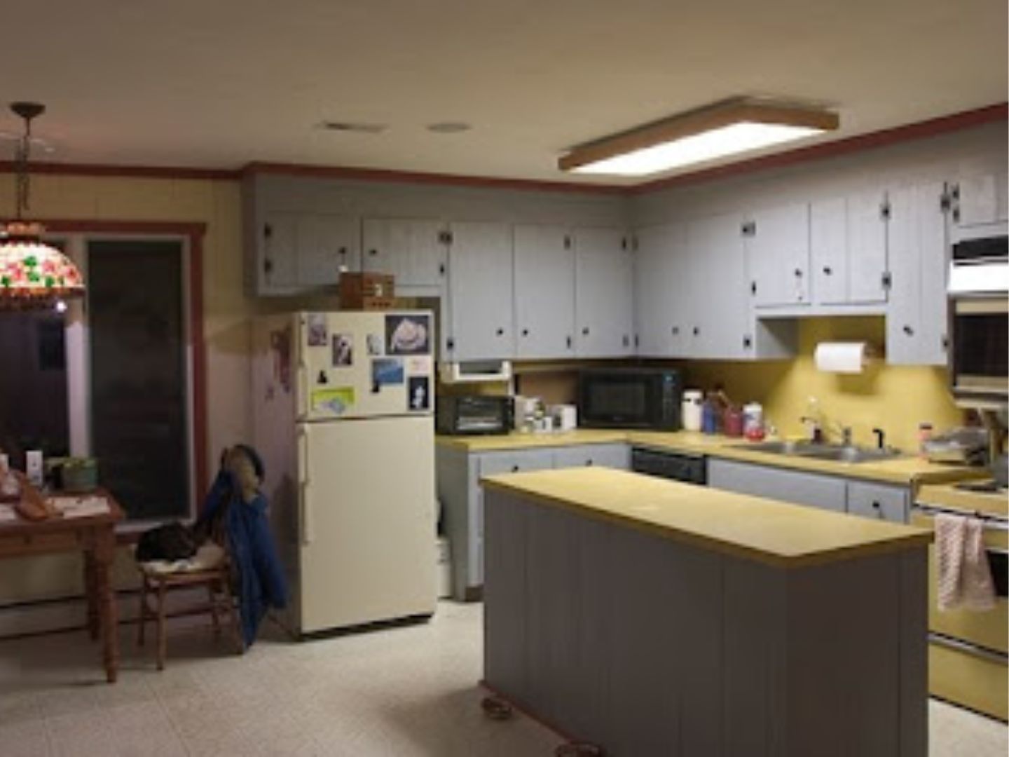 Outdated kitchen before remodel with dated cabinets
