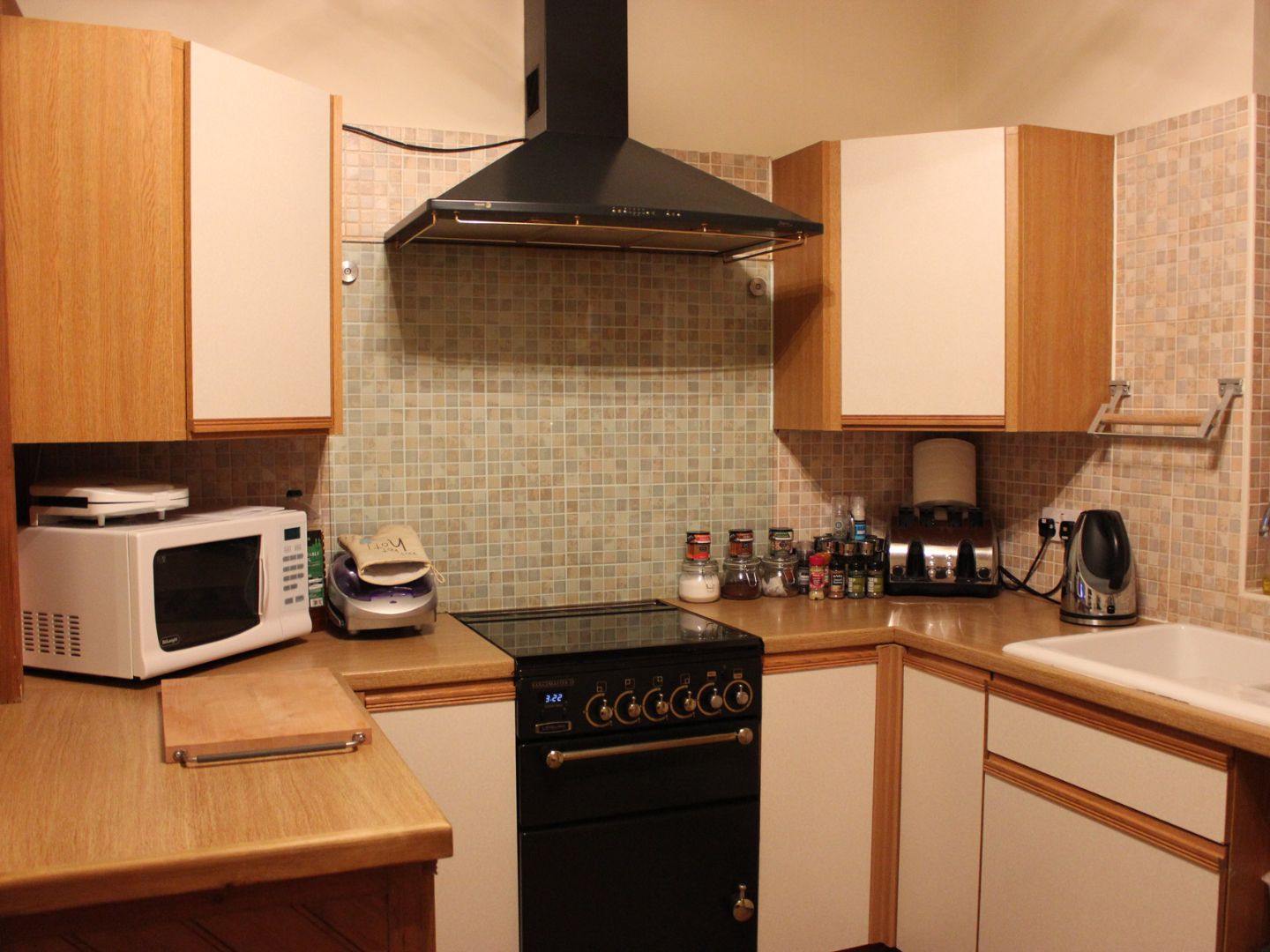Small outdated kitchen needing renovation showing common layout issues Bay Area homeowners face
